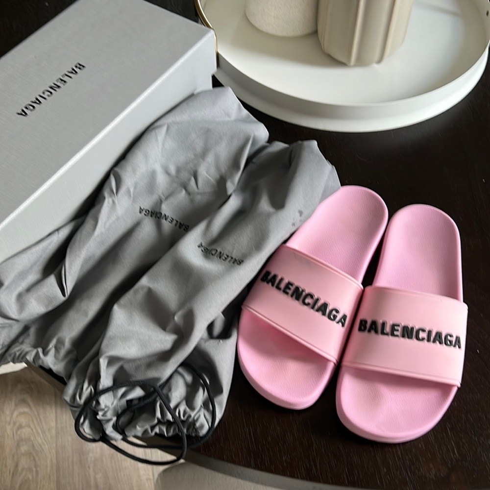 Balenciaga logo-embossed rubber slides in pink, size 39